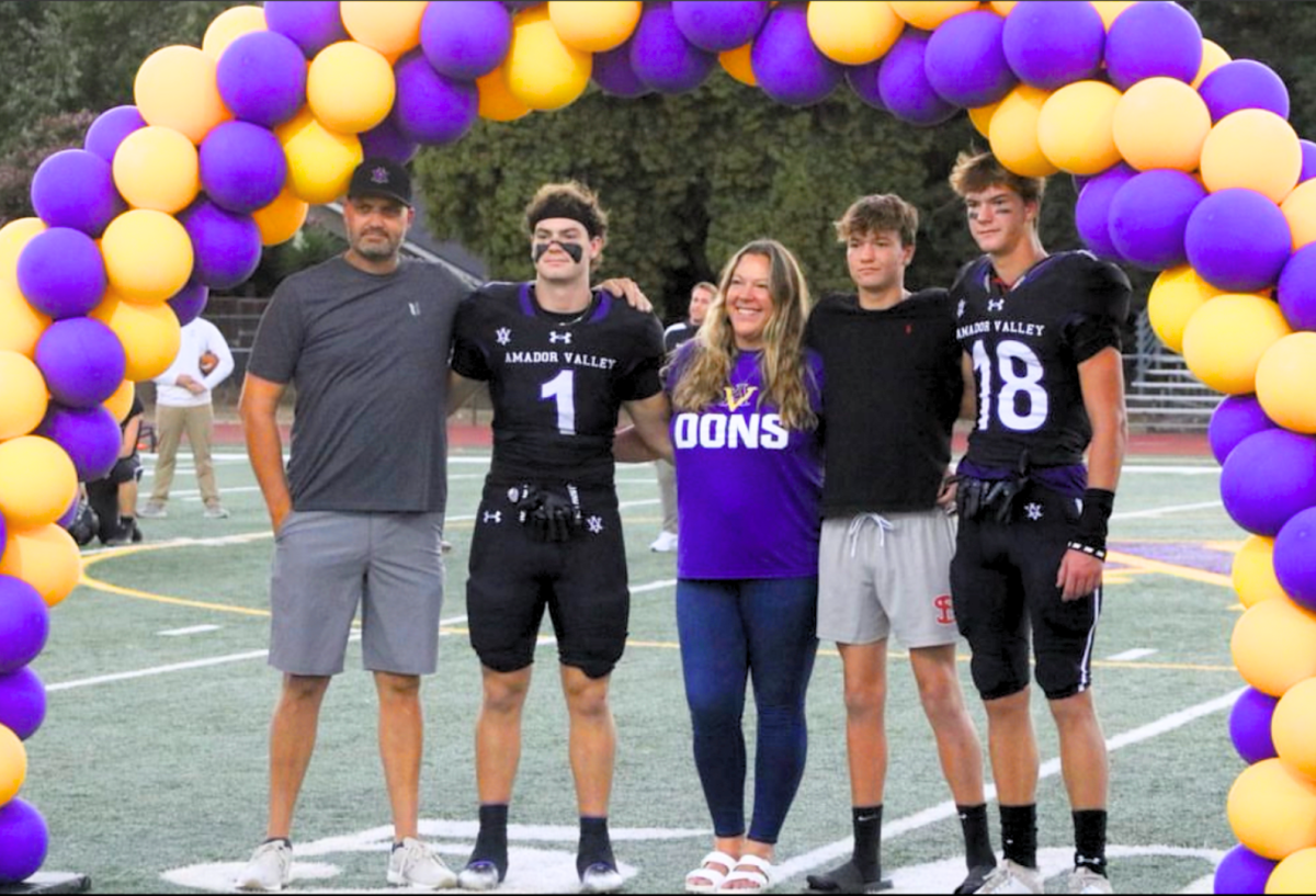 Senior+Jake+Goldsworthy+%2824%29+is+celebrated+in+the+Senior+Night+Game+with+his+family+right+by+his+side.