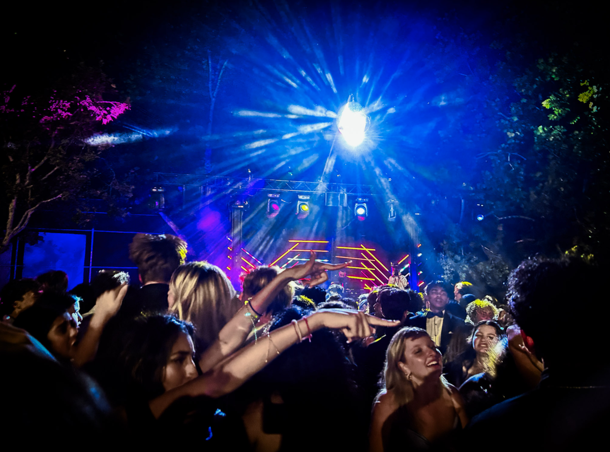 Students groove to the beats spun by the DJ.