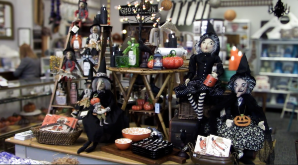 Inside American Harvest, playful witches brew a magical Halloween vibe.