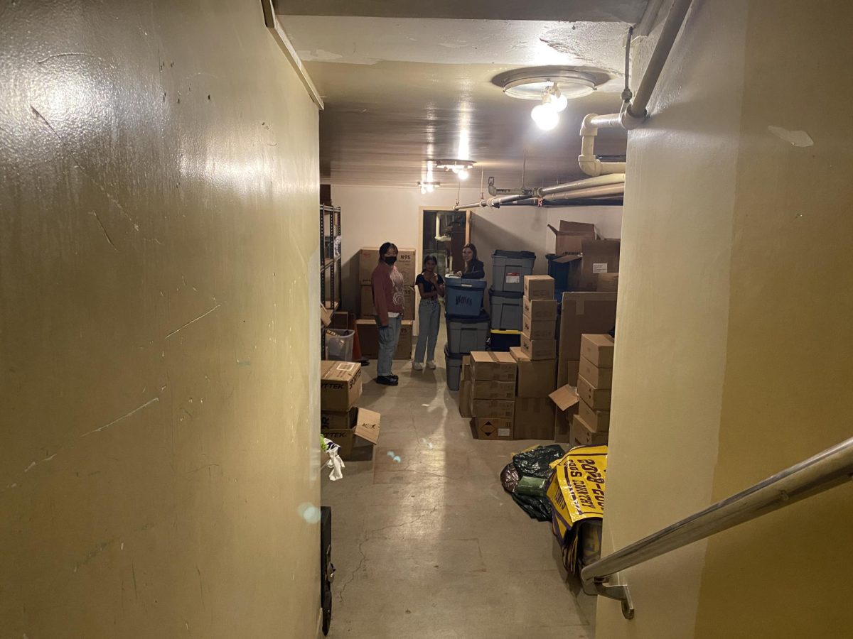 Before the dungeon transformed into a haunted chamber, the drama class worked to clean up the old supplies.