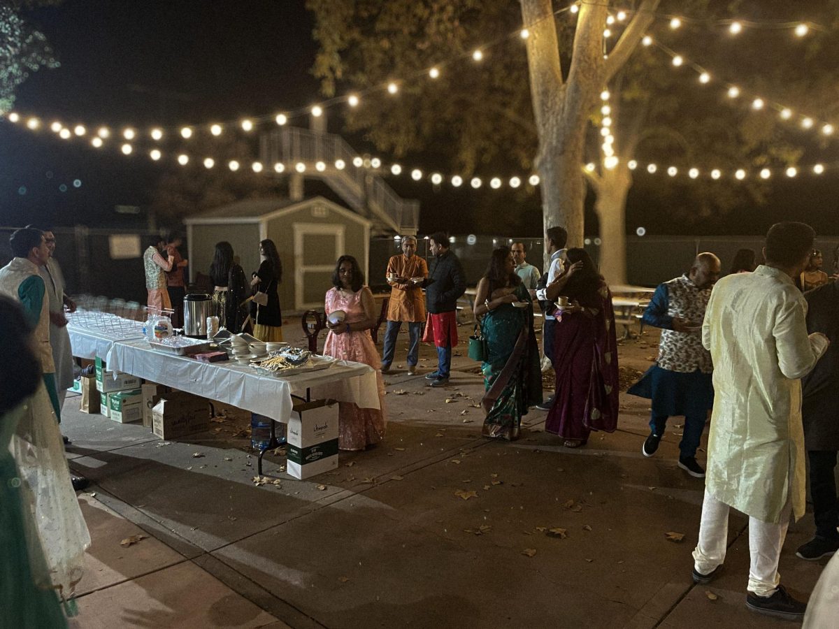 Friends and family rents out an area to meet and enjoy the holiday in their cultural clothing.