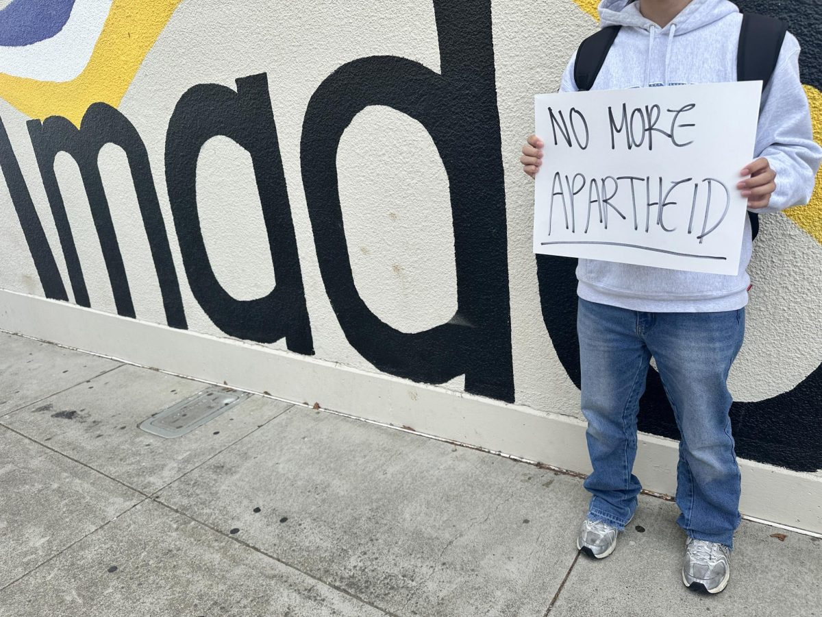 Student protesters held up straightforward signs to better convey their call for a ceasefire.