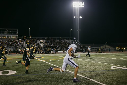 Nate Jetter (24) runs down the field for a 71 yard receiving touchdown against Granada in a dramatic win.
