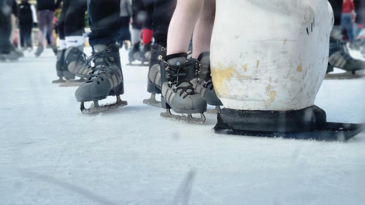 A sea of people ice skate at the Union Square Ice Rink.