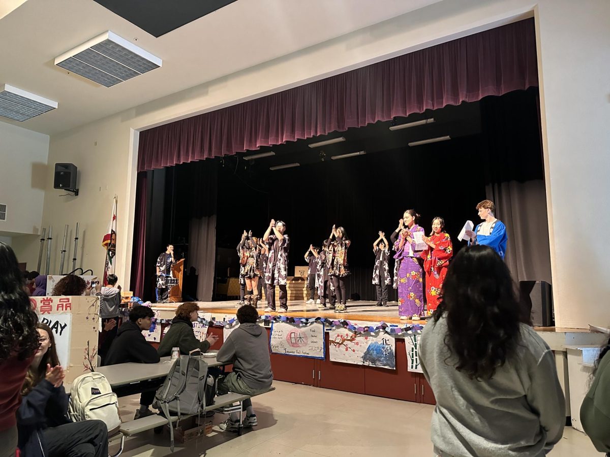 A group of students perform a Oendan dance, a traditional Japanese cheer.