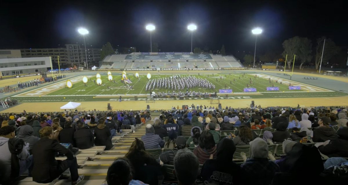 The+Amador+Valley+Marching+Band+and+Color+Guard+performs+their+2023+field+show%2C+Mirror+Mirror%2C+for+the+last+time+in+Sacramento+Hornet+Stadium.