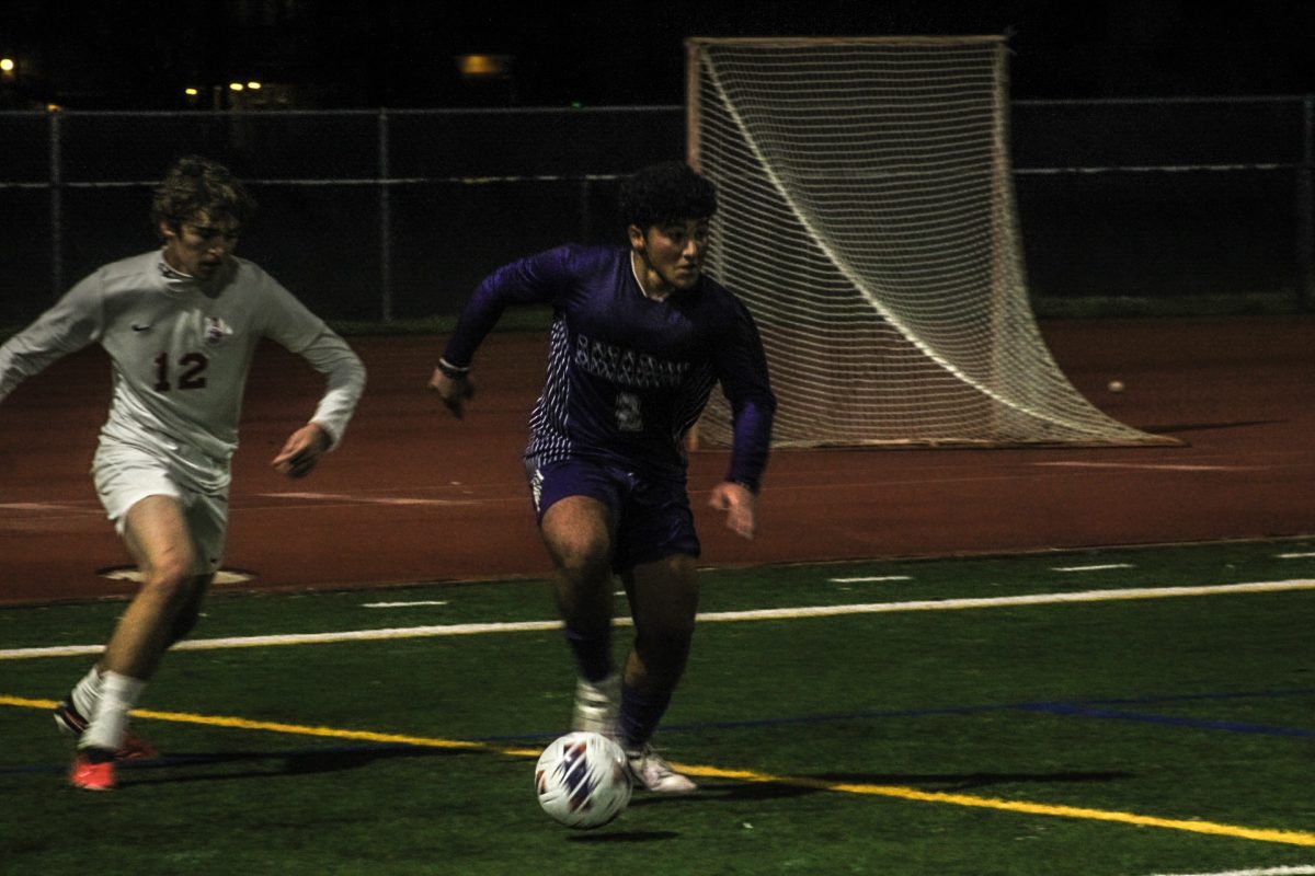 Ramsey Hanna ('25) looks for a cross on Dublin's side. 
