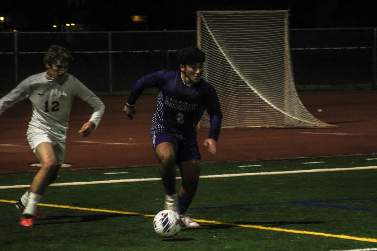 Ramsey Hanna (25) looks for a cross on Dublins side. 