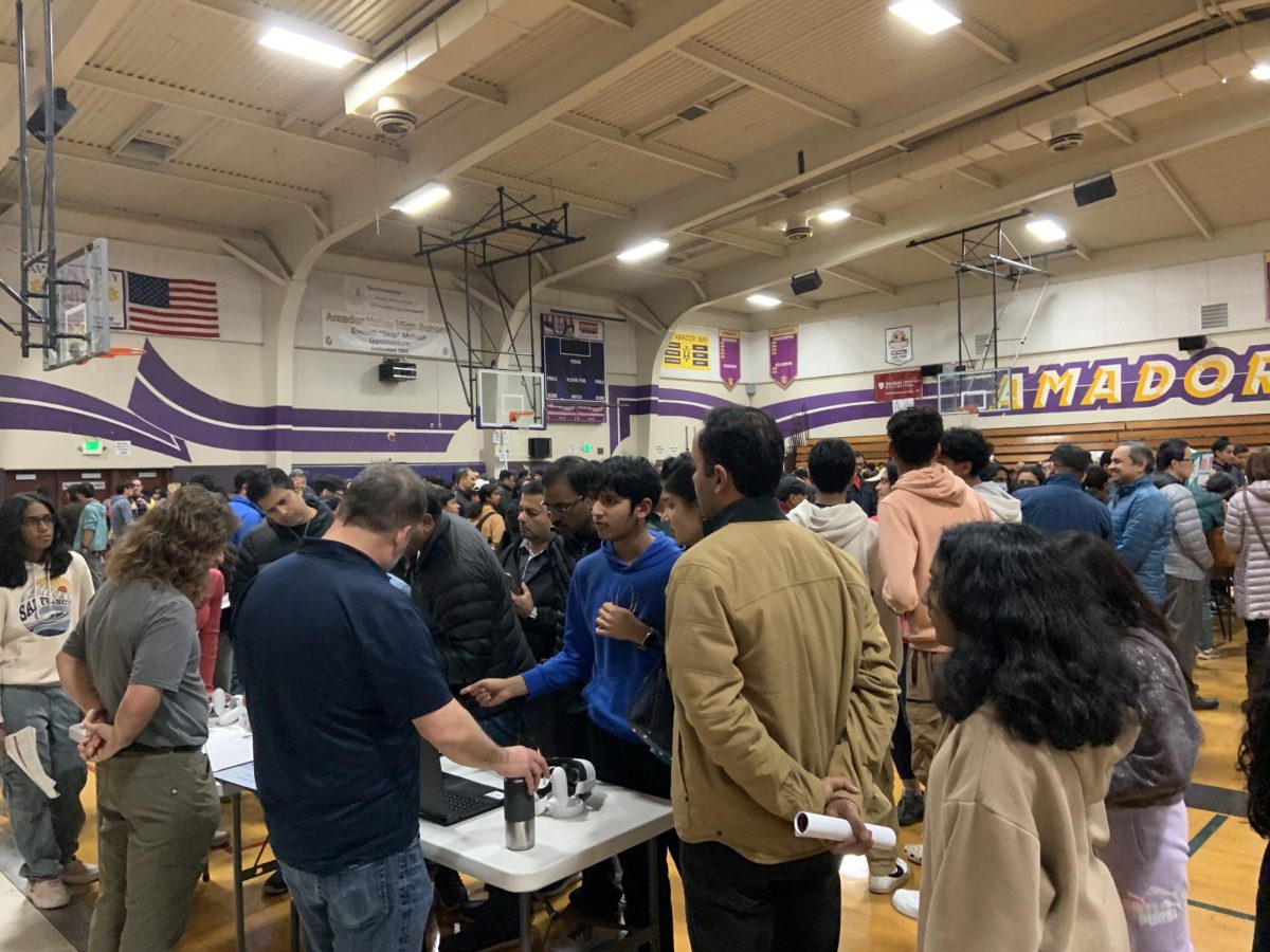 The Computer Science booth remains a popular destination.
