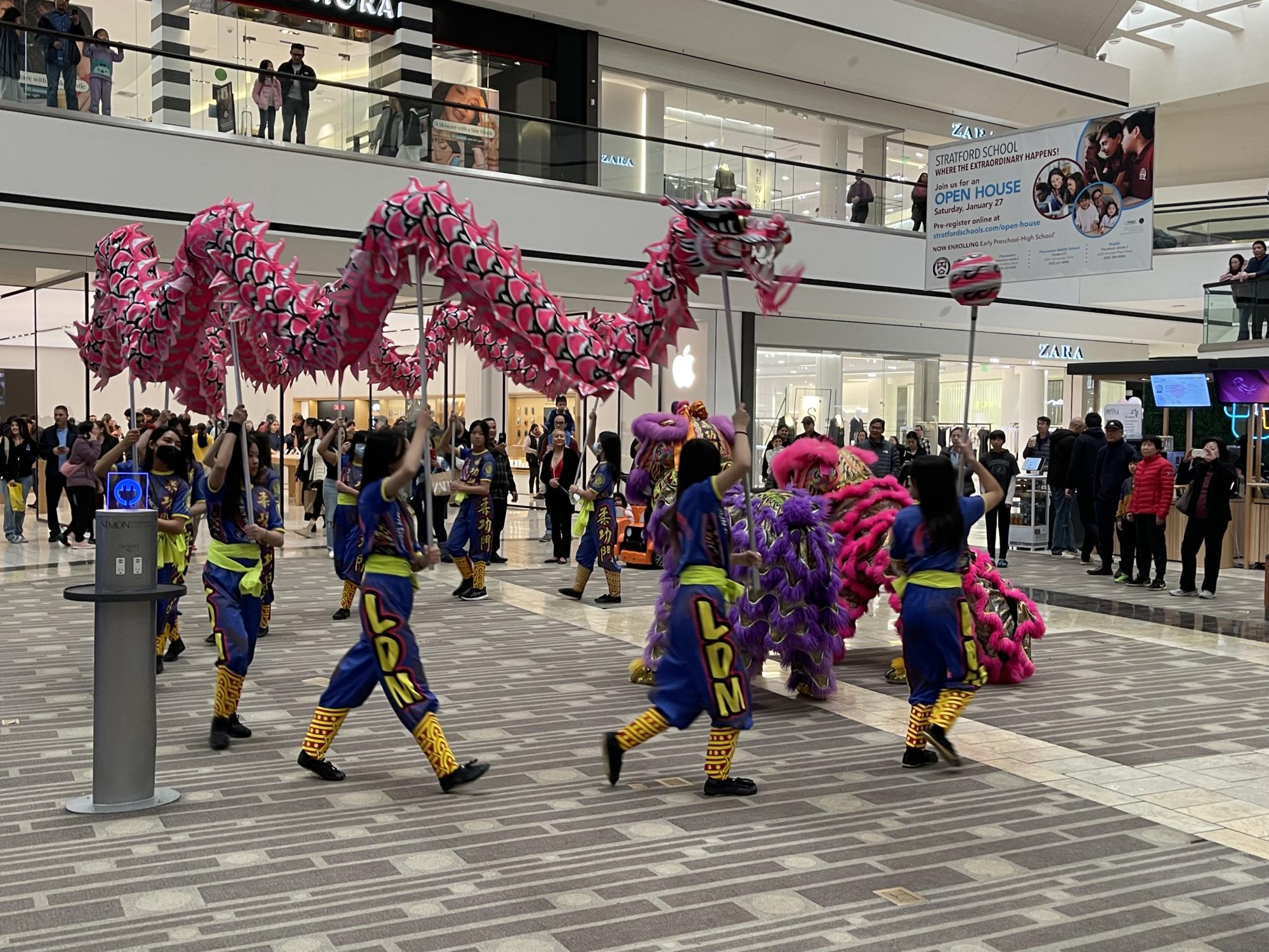 Dances, drums, and dongs welcome Stoneridge Shoppers to the Dragon Year