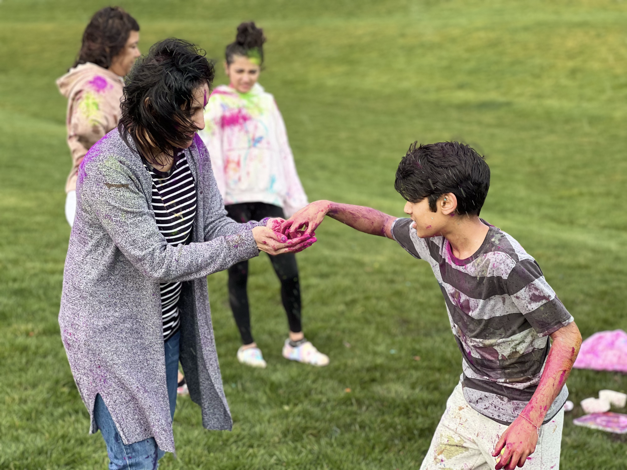 Dance and dye, reach the sky: Holi festivities paint the world with joy, laughter, and color