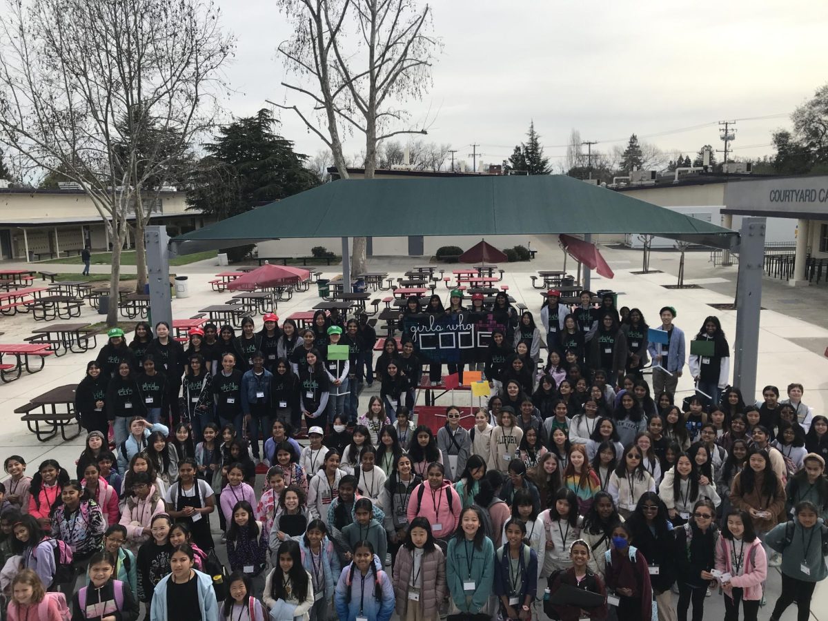 The over 150 participants and mentors gathered for a photo to commemorate their experience at the summit.