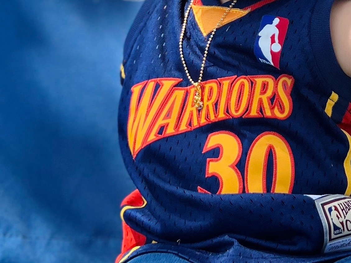 The old Warriors jersey embodies the We Believe era with its iconic design and the legacy of resilience and triumph it symbolizes.