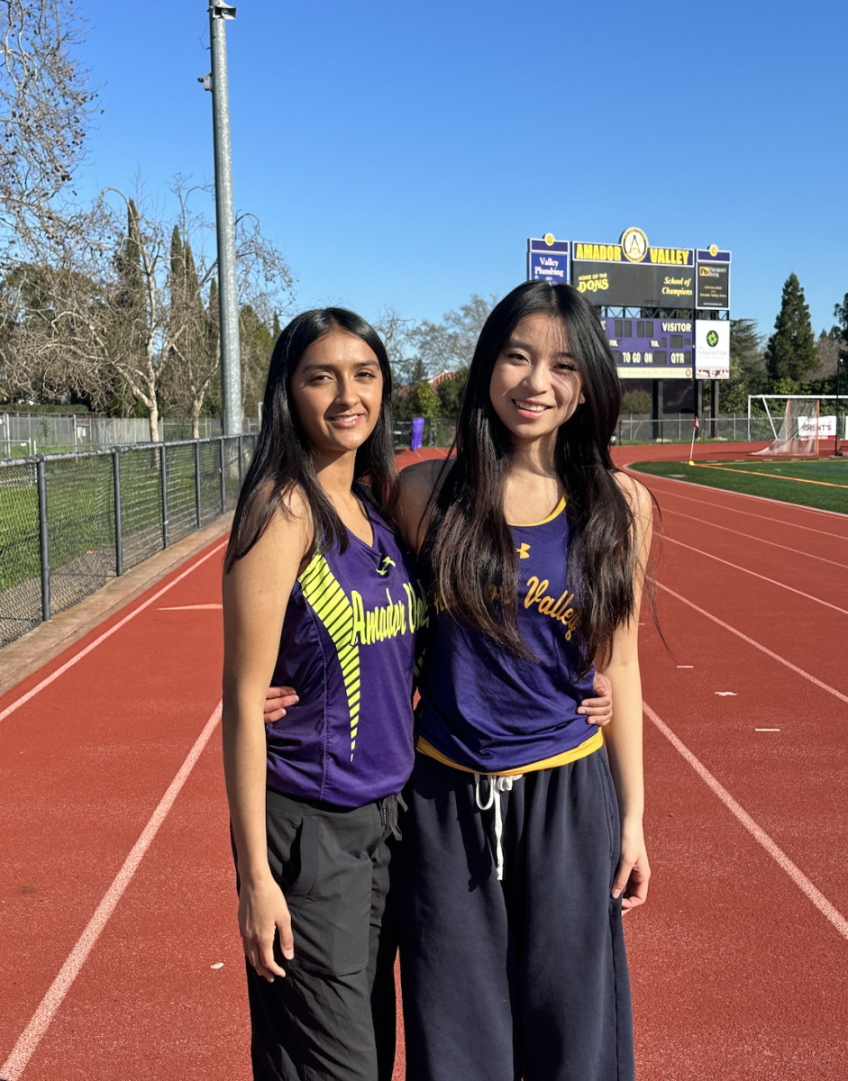 Celine Lu (‘24), on the right, mentors and coaches younger sprinters as sprint captain.