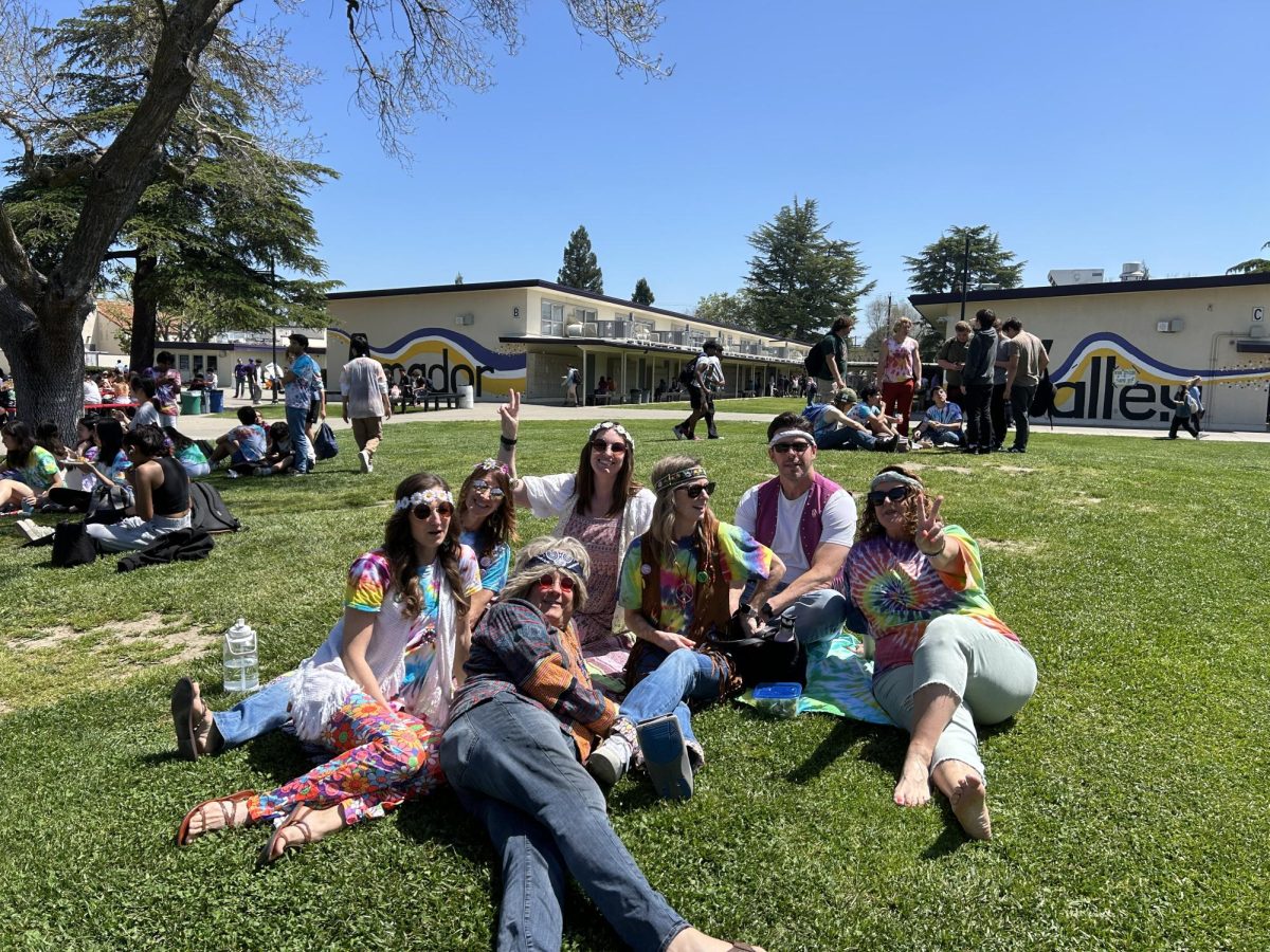 Atop hippie hill, all of the US history teachers gathered to spread the flower-power.