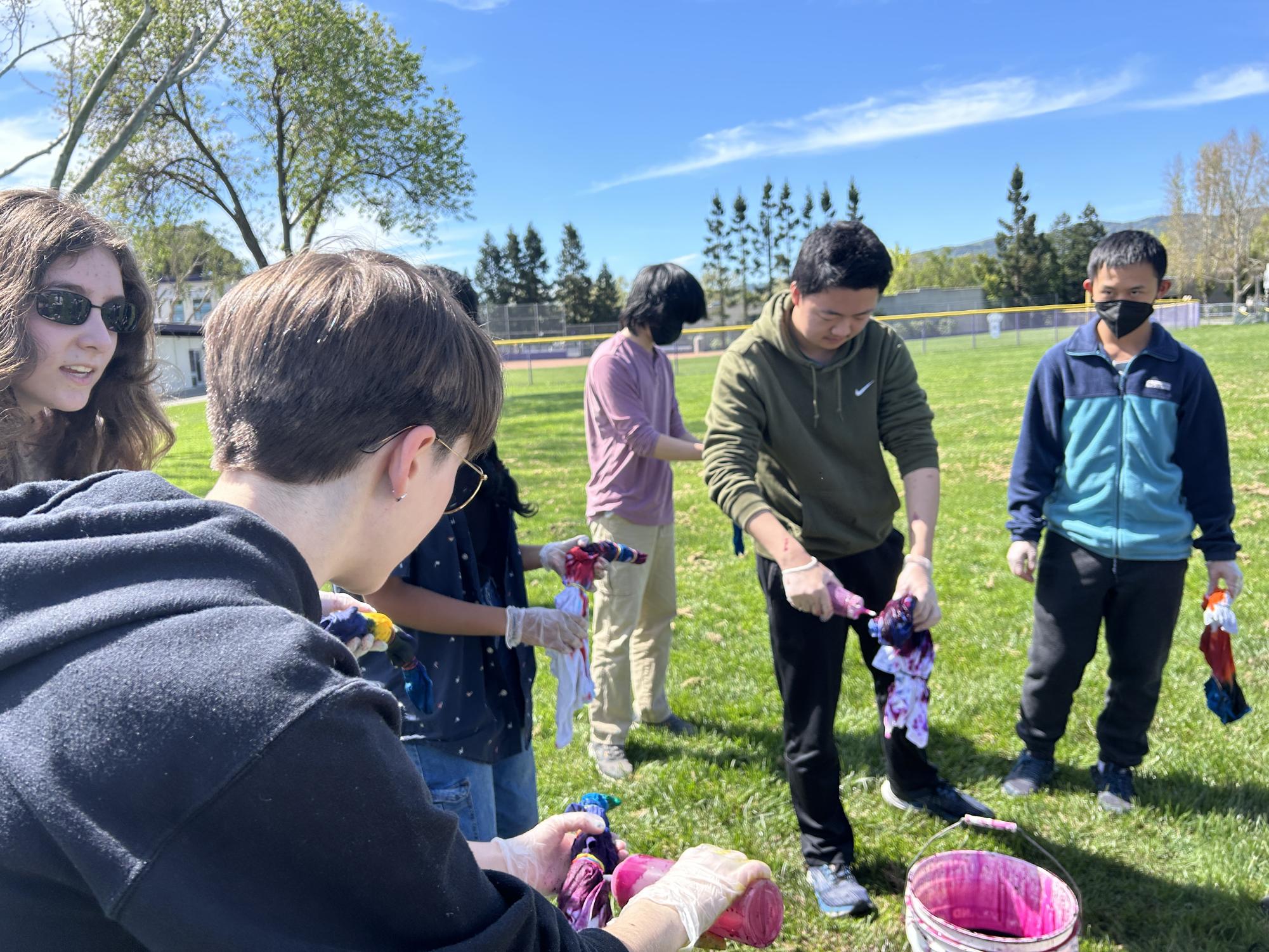 Juniors tie-dye t-shirts & celebrate counterculture day