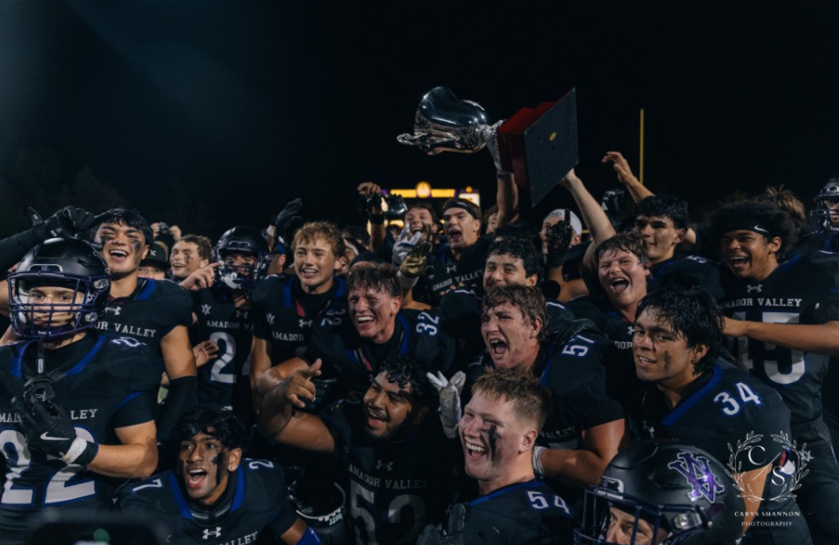 AV Varsity Football Team Wins Rivalry and Celebrates with Trophy