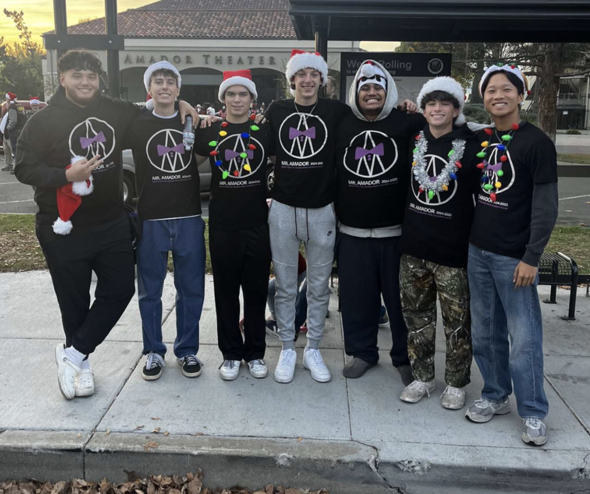 The 2024-2025 Mr. Amador team poses for a picture after a successful holiday parade appearance. 
