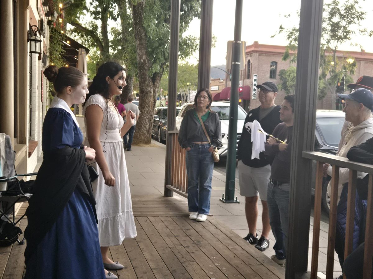 Grieving widow and Prim Boutique employee share their haunted life stories outside Prim Boutique.