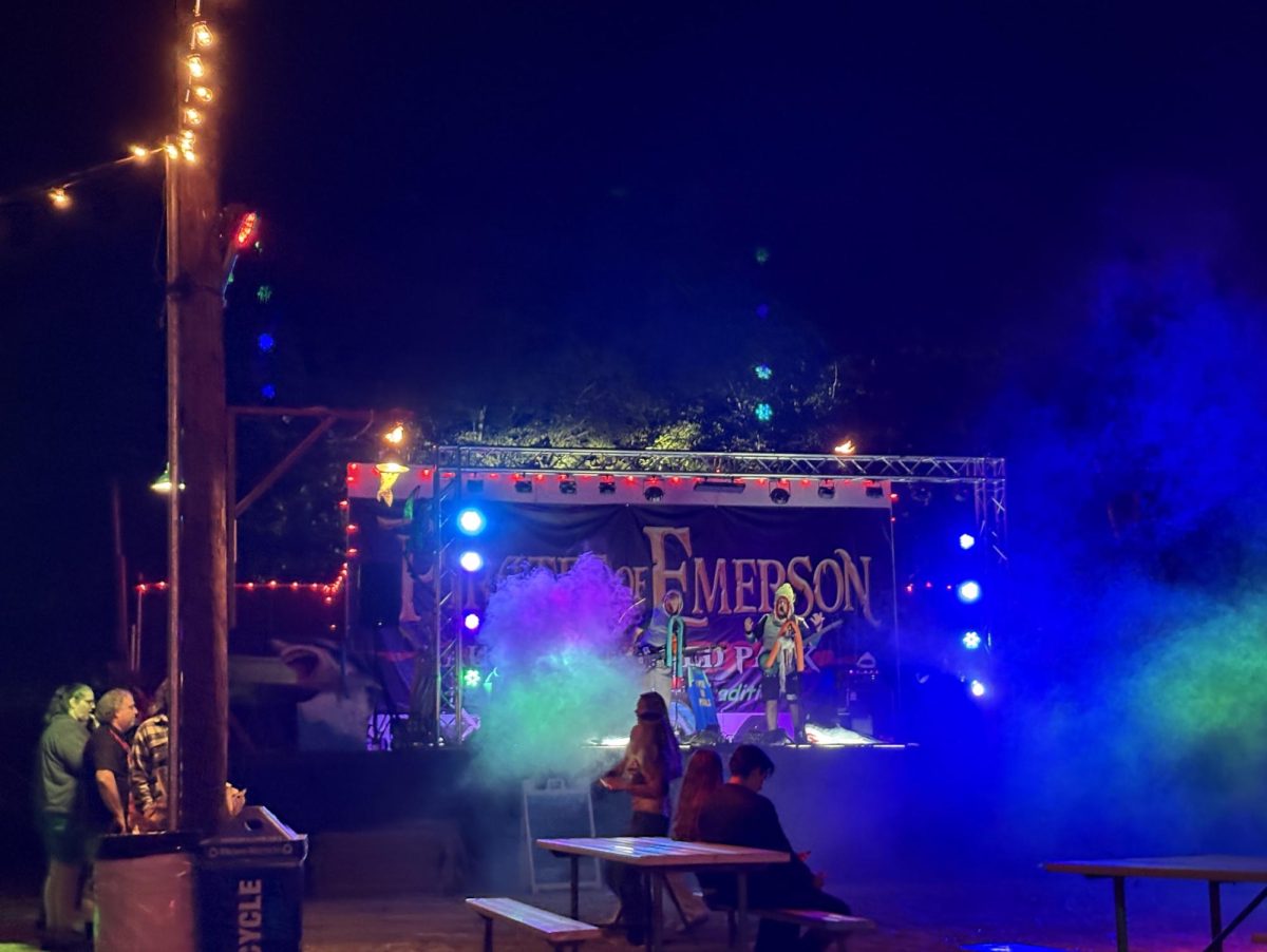 Pirates of Emerson performers play metal music in the midst of fog and smoke to create a spooky, intense atmosphere.