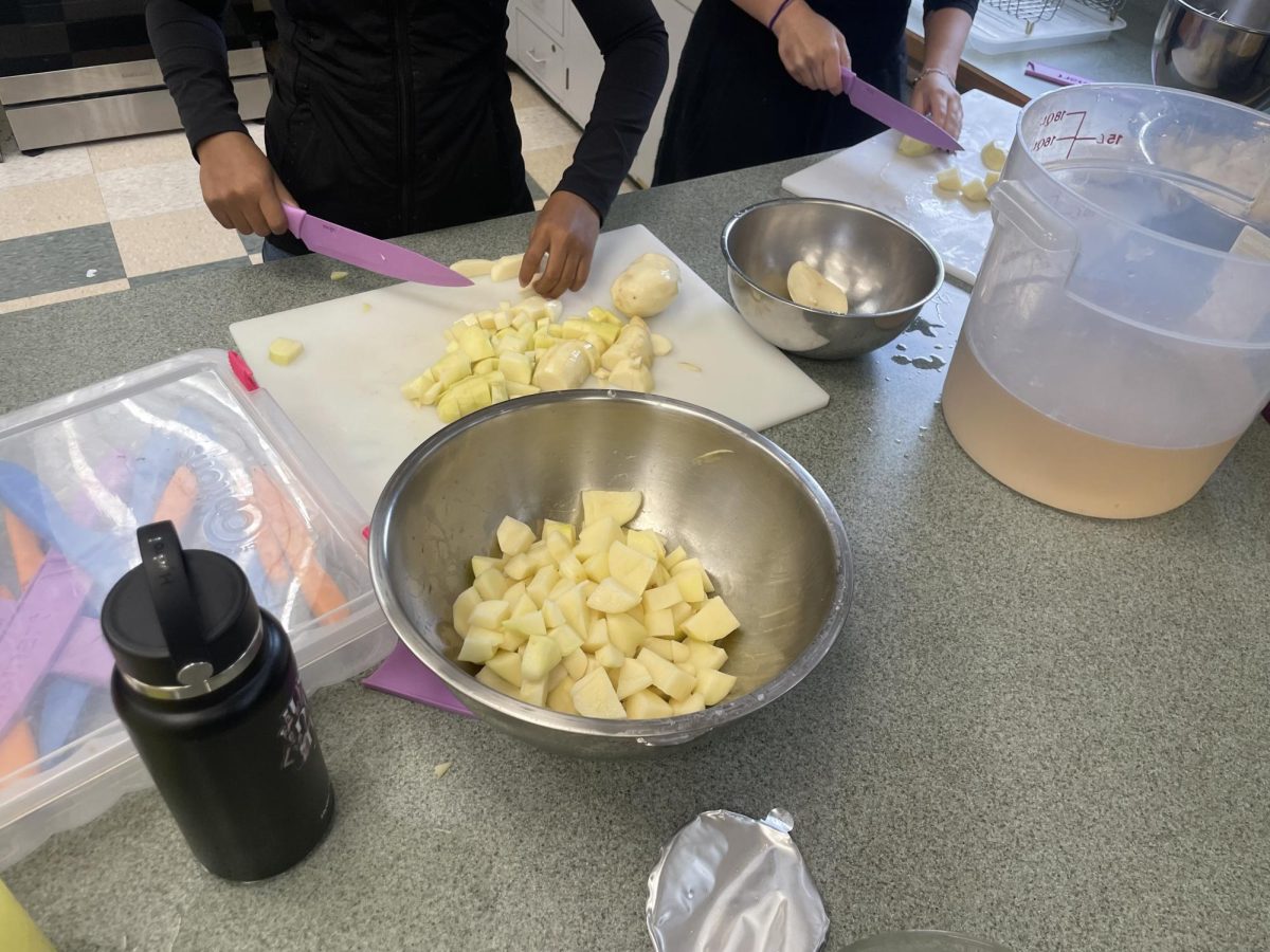 The culinary students work hard to prepare the Thanksgiving meal for all of the class to share. 