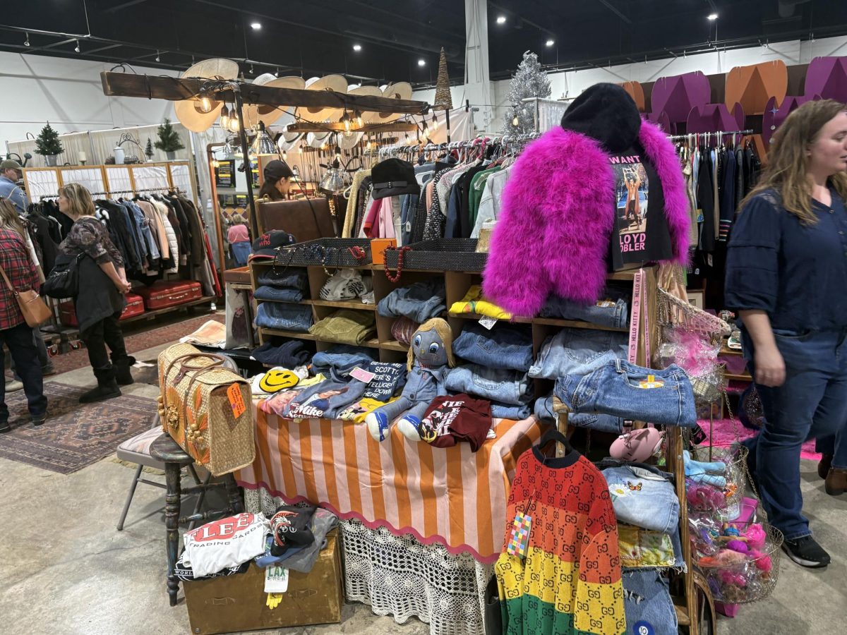 Colorful clothing and denim items being sold at a popular booth at the Junk Hunt.