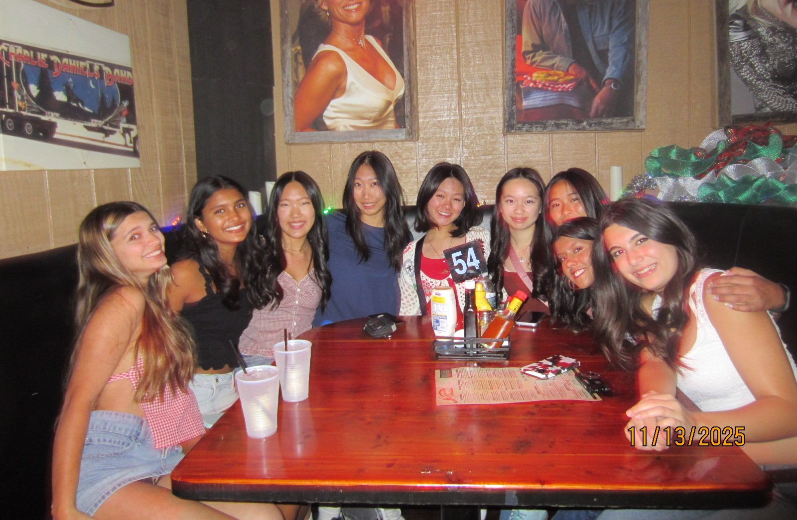 Out to dinner at the Nashville Palace, AV Journalism students Izzy Cantu (27), Riya Upadhyaya (27), Naomi Song (27), Hannah Yao (27), Leona Jew (27), Emma Luey (27), Sarina Liu (27) Sikha Ray (27) and Sarina Lashkakarian (28) smile for the camera. They had just finished the first day of the pre-convention workshops, the average length of which was around six hours. 