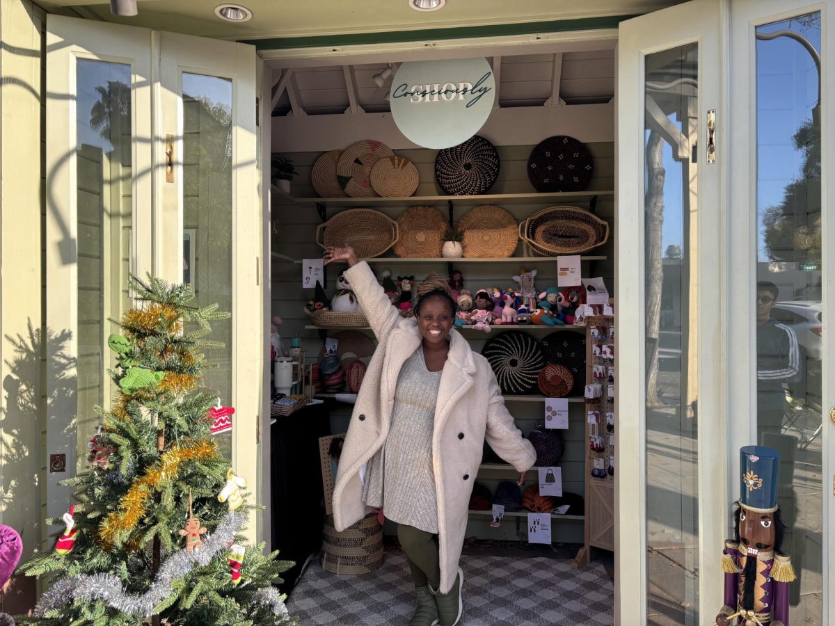 Shop Consciously founder Mpho Hansje showcases the store's wide variety of hand-crafted items and toys.