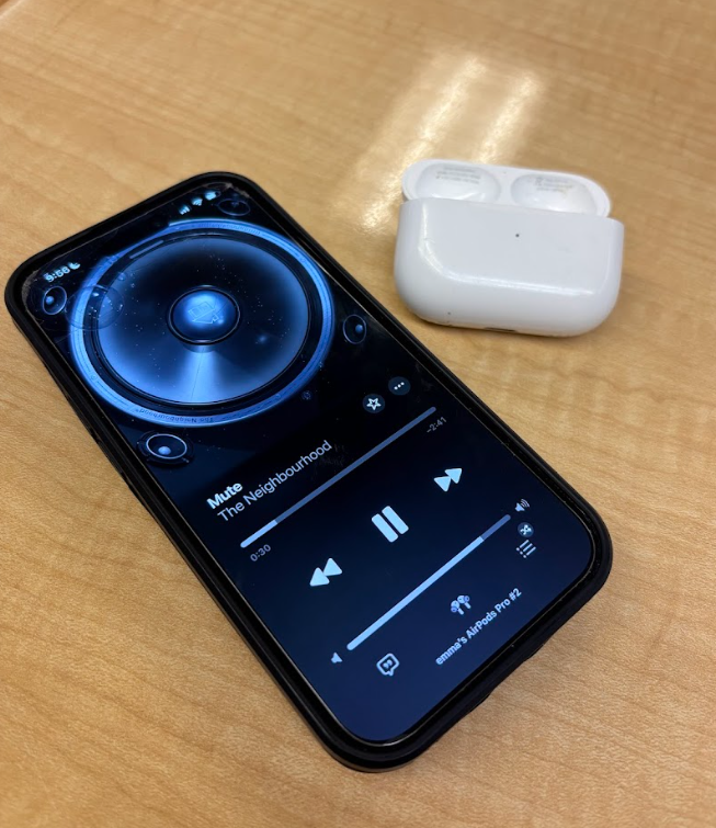 Close-up of a students phone playing “Mute” from The Neighbourhood’s new release.
