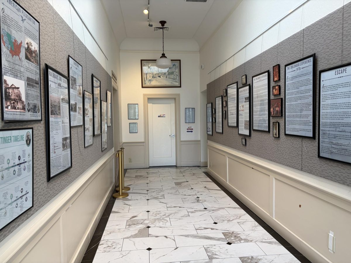 The exhibit features over ten frames of information and photos about local immigrants and immigration trends.