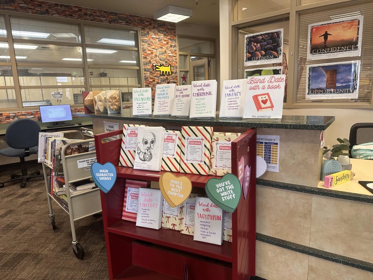 The Blind Date with a Book stand is set up in the Amador Library and is available to all students. 