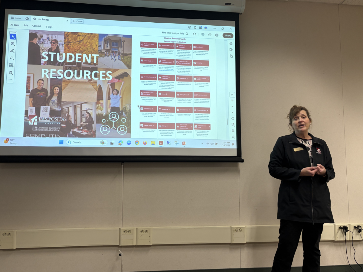 Dual Enrollment counselor Traci Peterson presents an introduction slide to the program during access period.
