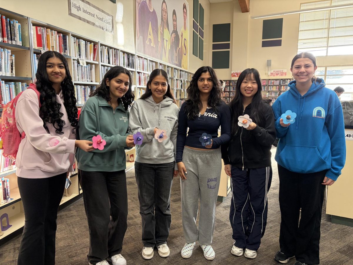 Angali Daita ('27), Devena Bhandula ('27), Rujuta Paranjpe ('27), Prisha Saraf ('27), Allison Chen ('27), and Natalia Bharaj ('27) show off their hand-made kindness flowers.