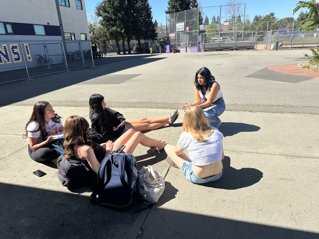 Club president Gargi Kanetkar (‘27) rehearses the script for their upcoming film project with the club's actors.