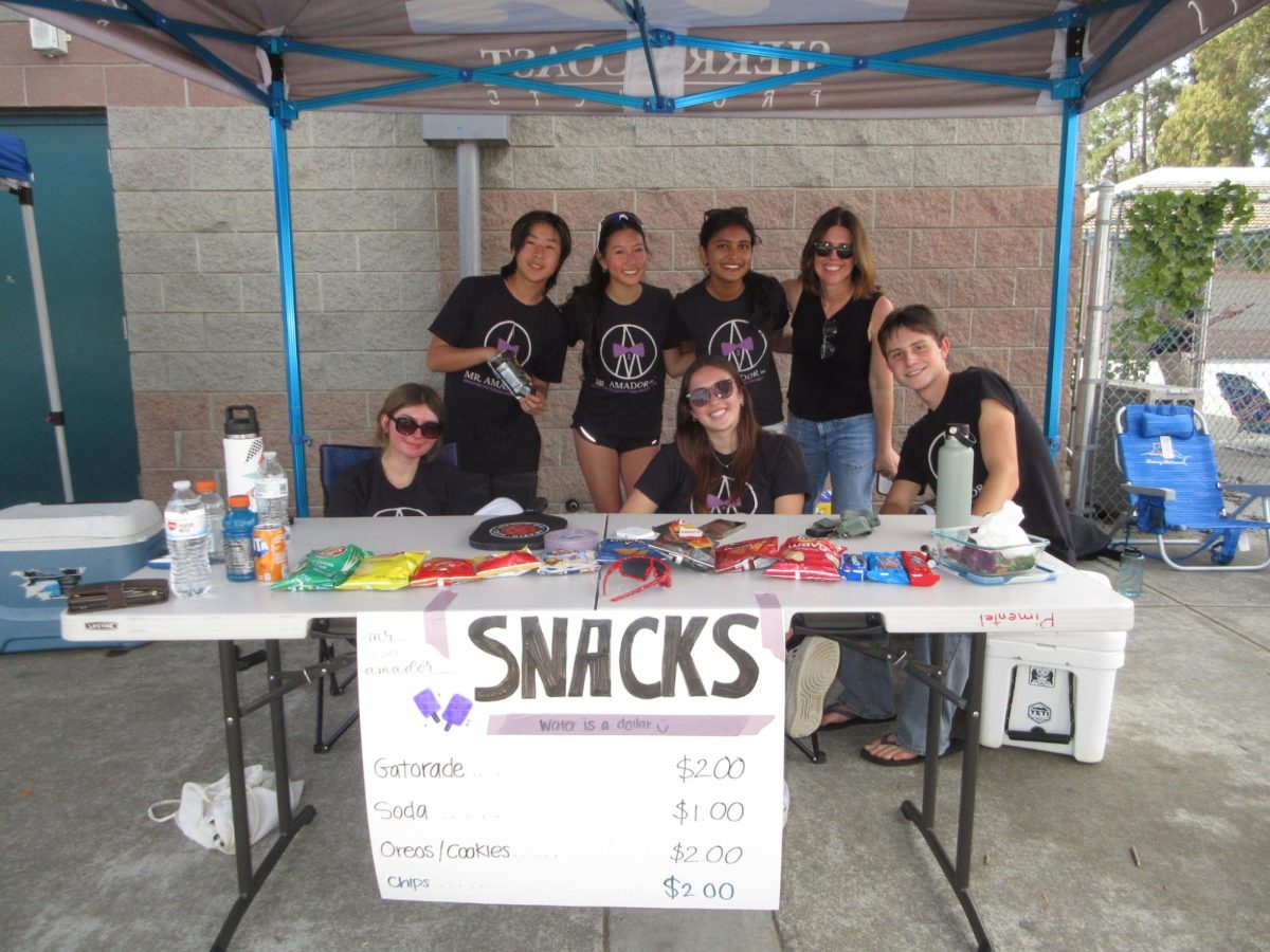 Members of the Mr. Amador planning committee sell snacks at the Pickleball Tournament Fundraiser. 