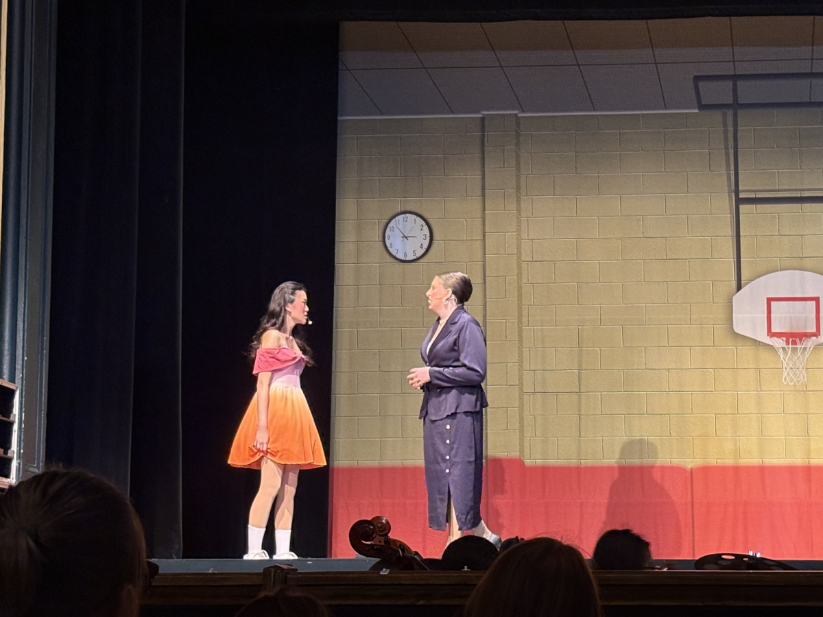 Alyssa Greene stands up to her mother and PTA leader played by Dahlia Saah ('28).