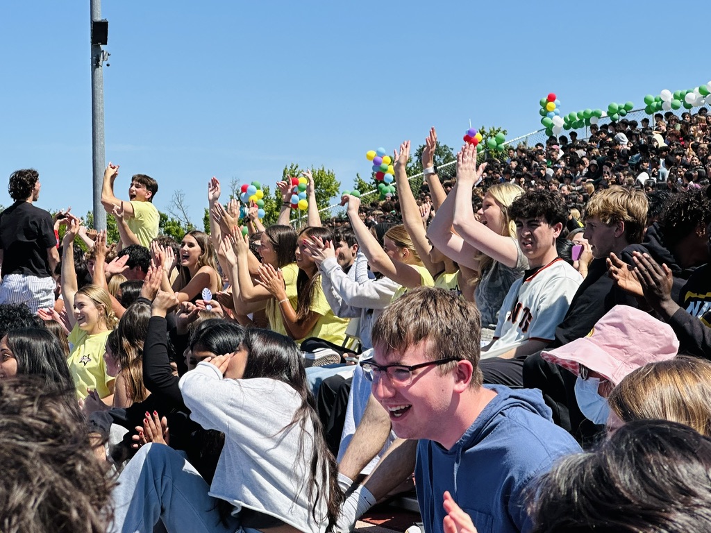 After a lively series of games, challenges, and competitions, the audience quiets for a moment as the MCs announce the winner of this year's Survivor Rally. The crowd goes wild in the senior section as the class of '26 jumps for joy at the announcement of their win.
