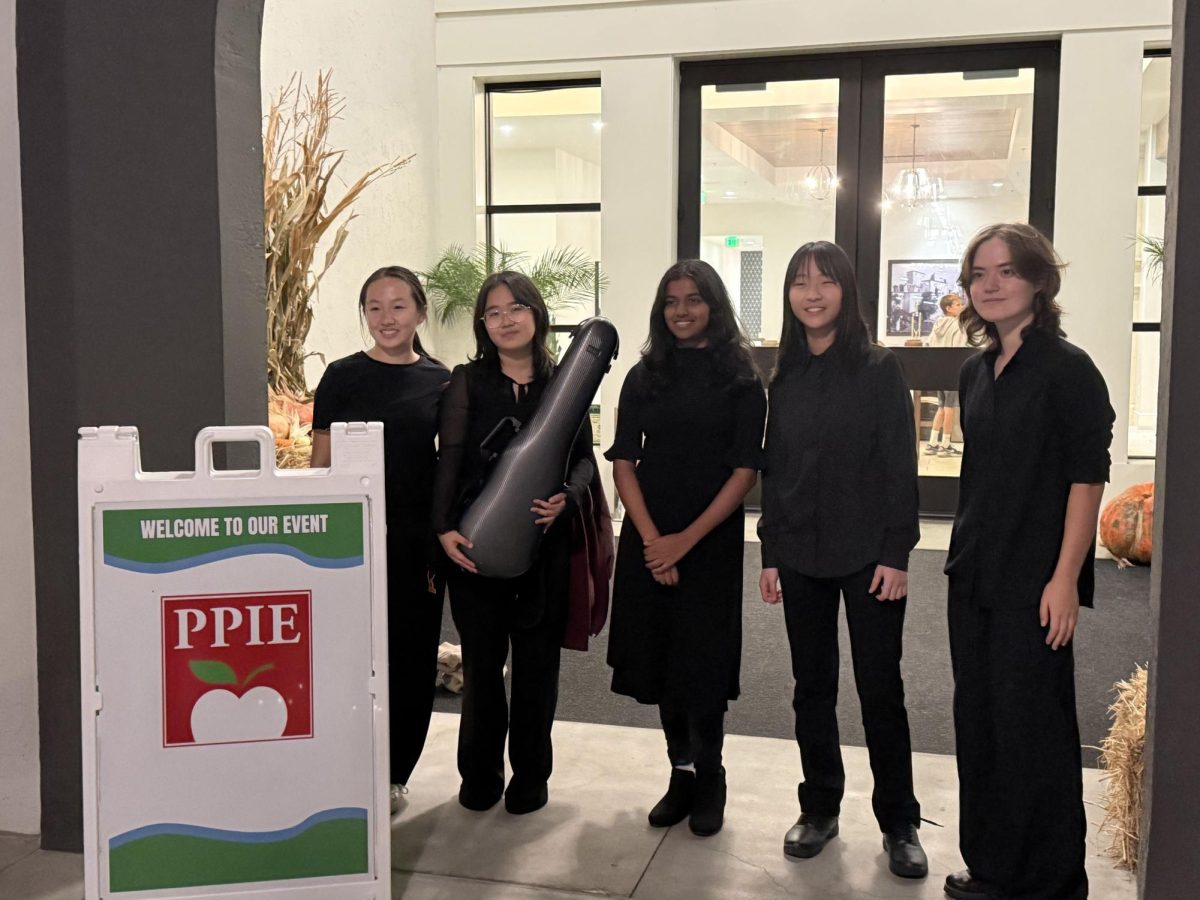 The Peace Music Foundation officers perform at the PPIE event for the Pleasanton community.